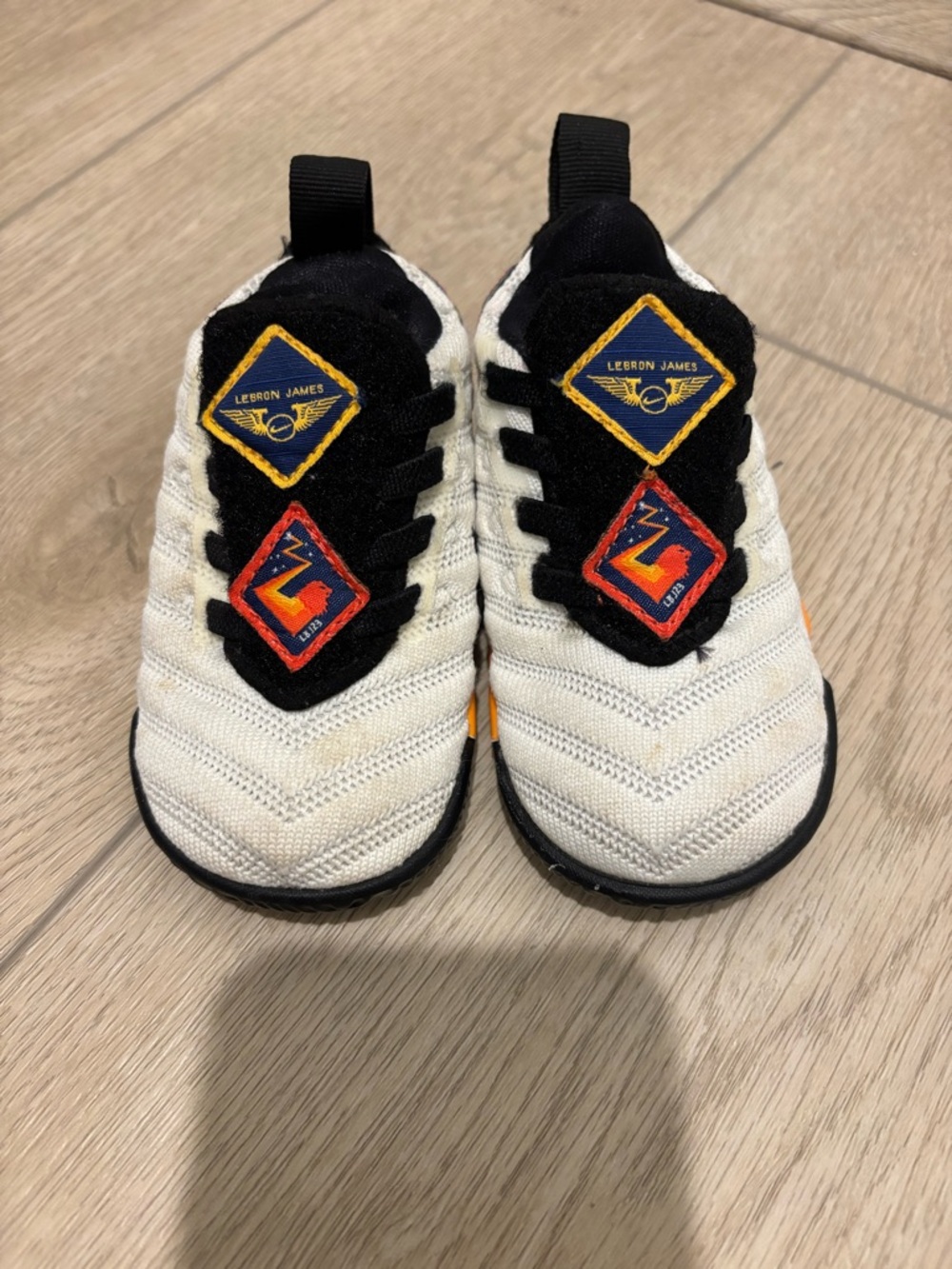 Nike lebron James White & Black Sneakers with Blue, Orange and Red Accents 5C